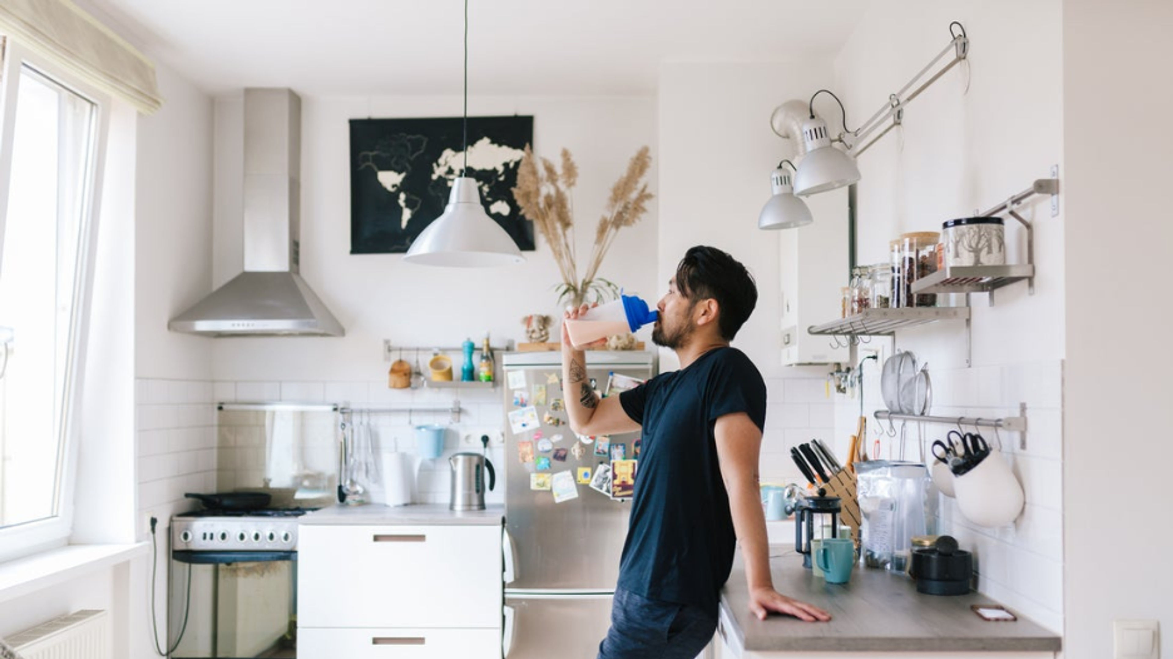 Man Drinking an iHerb Product