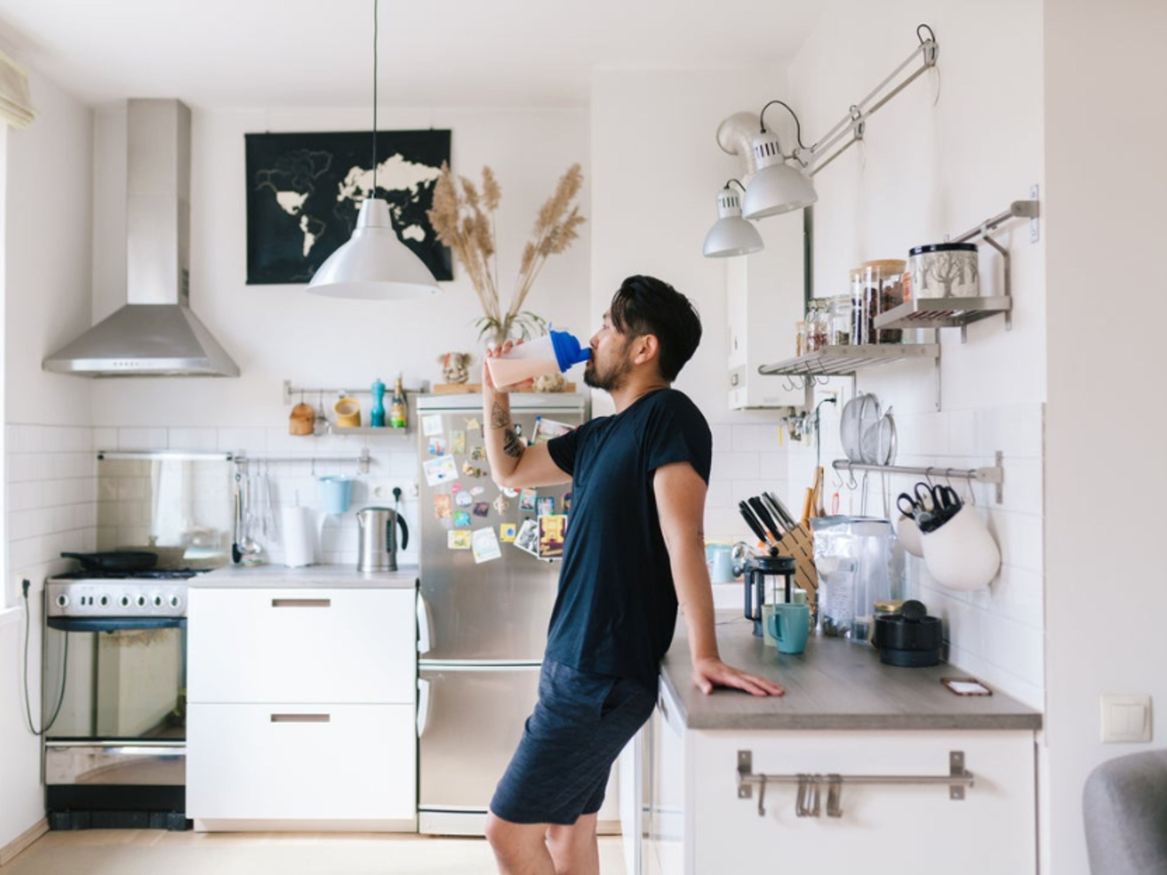 Man Drinking an iHerb Product 