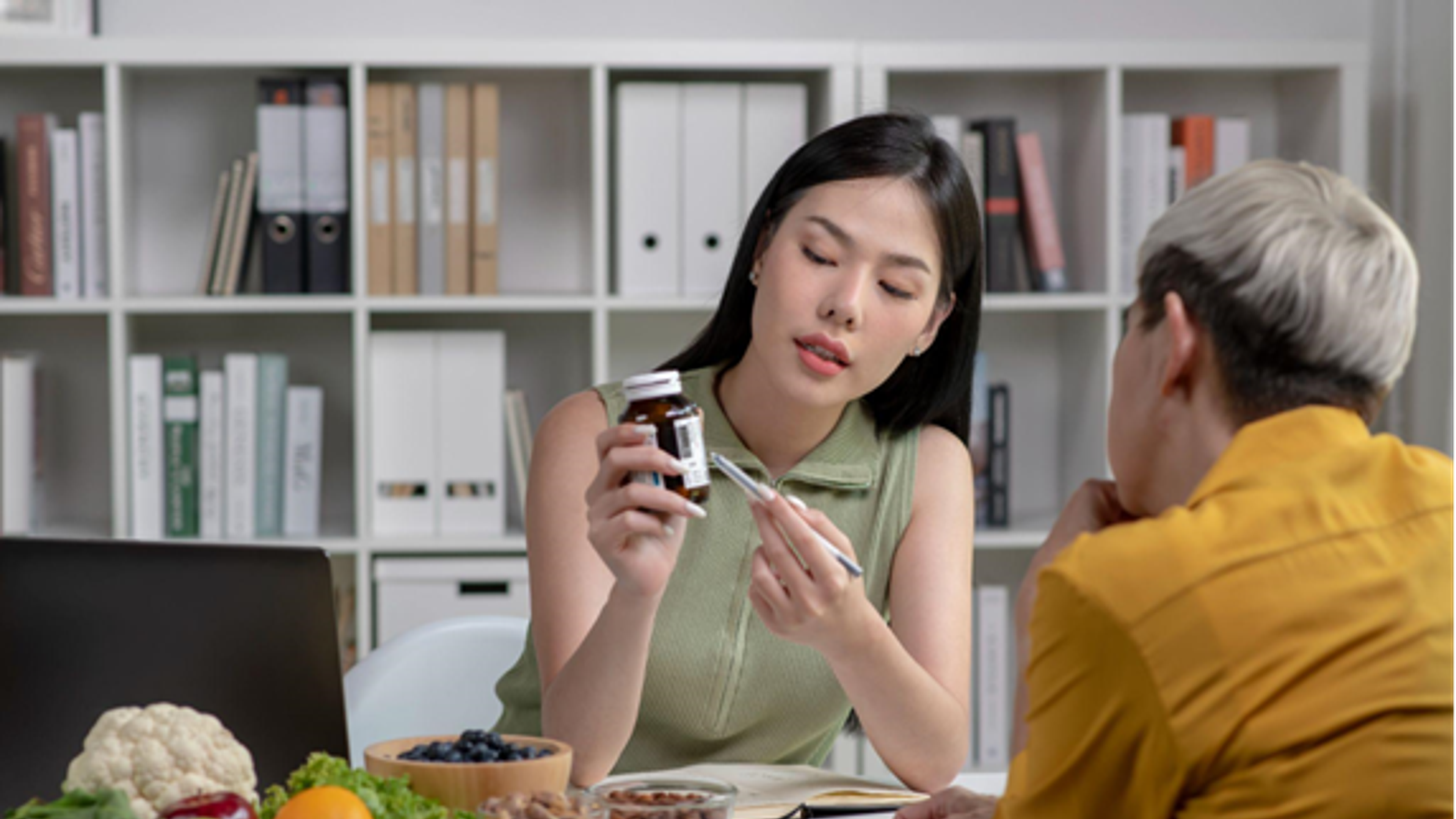 Woman giving pills
